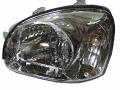 Santa Fe headlight lens cover housing assembly